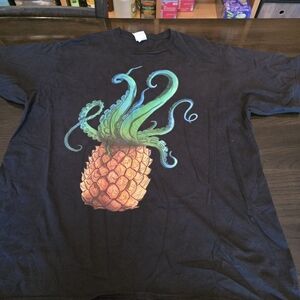 Port and Company Black T‑Shirt with Orange Pineapple and Green/Teal Tentacles